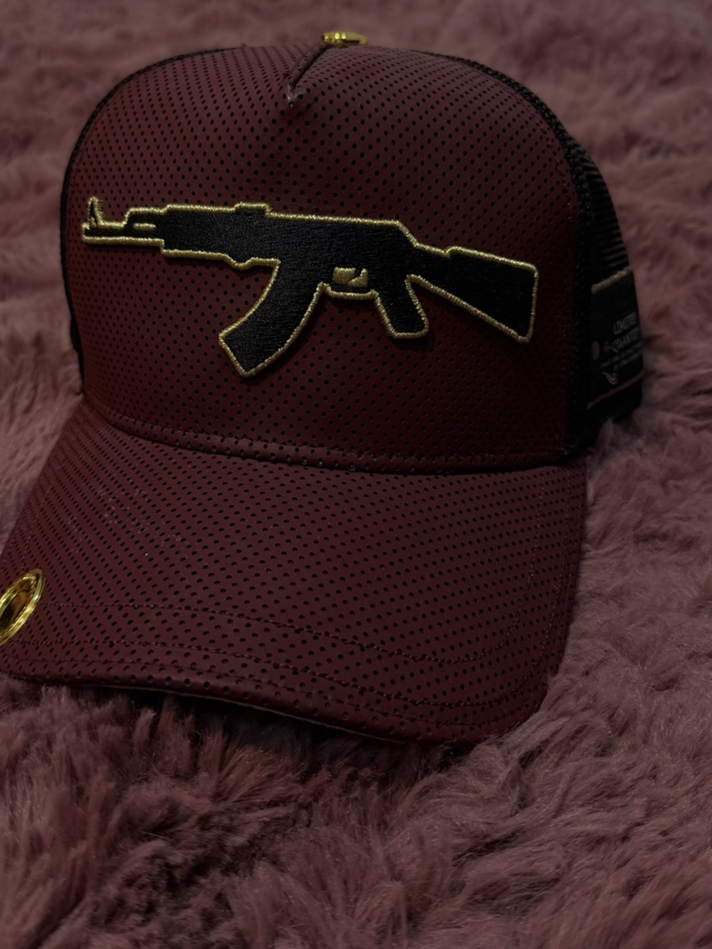 Maroon Mesh Trucker Hat with Black & Gold Rifle Patch